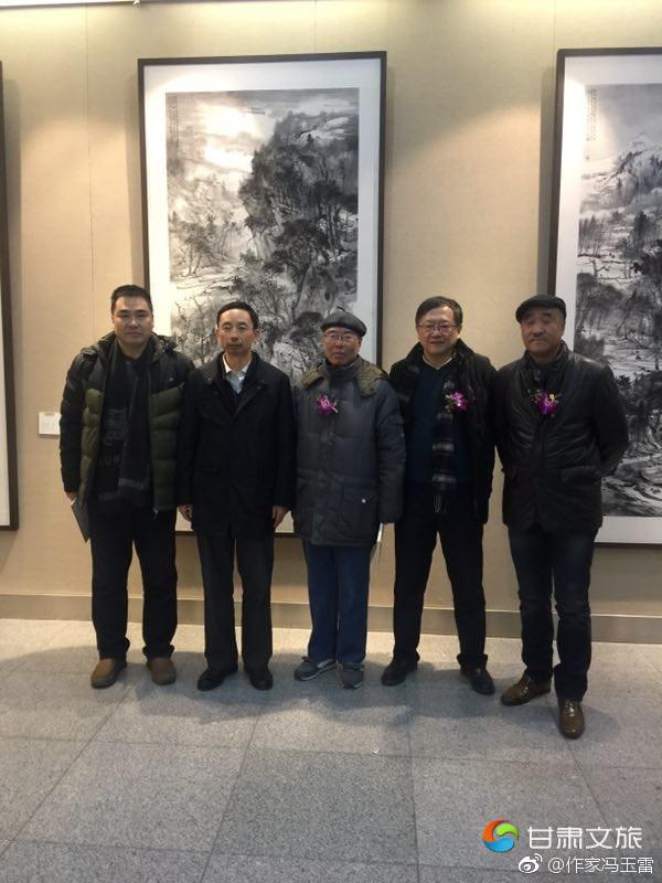 图4冯玉雷参加艺术活动时，与诗人、甘肃省文化厅副厅长杨建仁及美术家段兼善、李伟、方向军合影.jpg